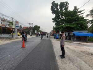 Kapolsek Kampar Kiri Laksana Strong Poin Pagi di SMA Negeri Lipat Kain, Kamtbcarlantas