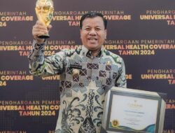 Bupati Kuantan Singingi Hadiri Penerimaan Penghargaan Universal Health Coverage